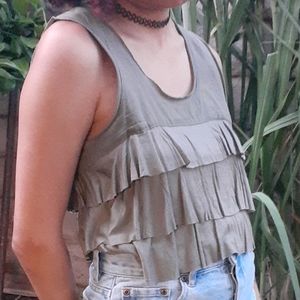 Green frilly top